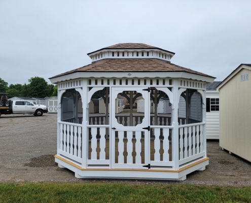 Wood gazebo in white and screened in